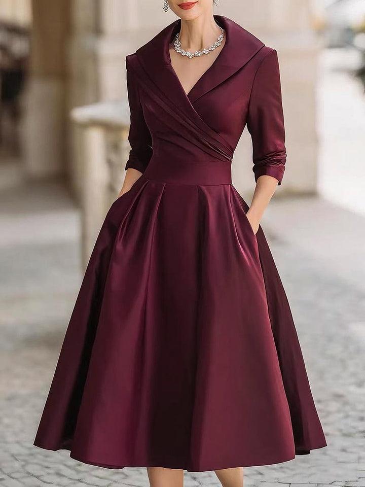 Dharmay | Elegancka sukienka midi